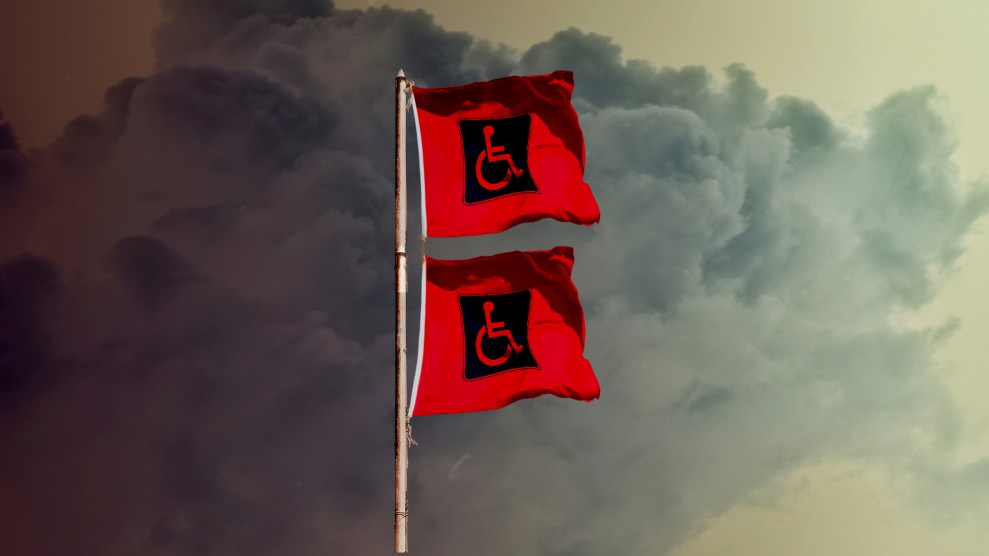 Hurricane warning flags billow against a sky darkening with cloudys. The two red flags have the International Symbol of Access at the center, instead of a plain black square.