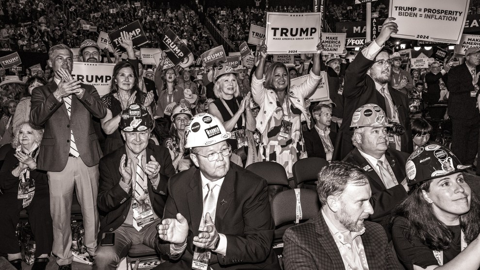 Black and white photo of crowd at RNC conventions. Some people wearing hard hats.