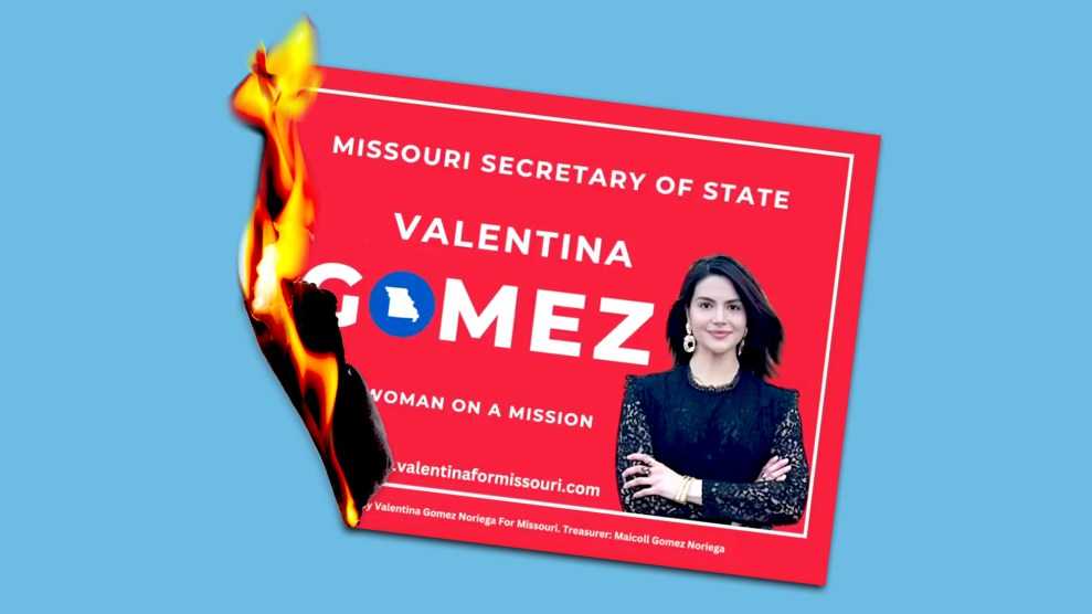 A Valentina Gomez campaign sign that has caught aflame.