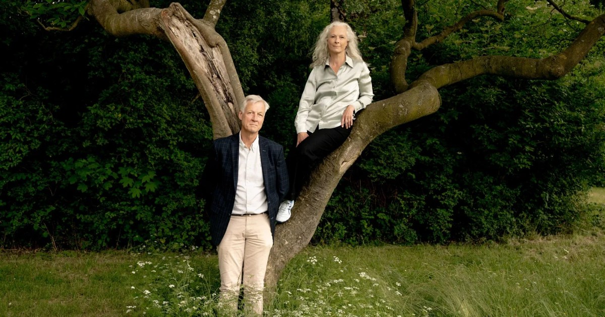 Peter and Susanne Ditlevsen reside near a tree in a meadow.