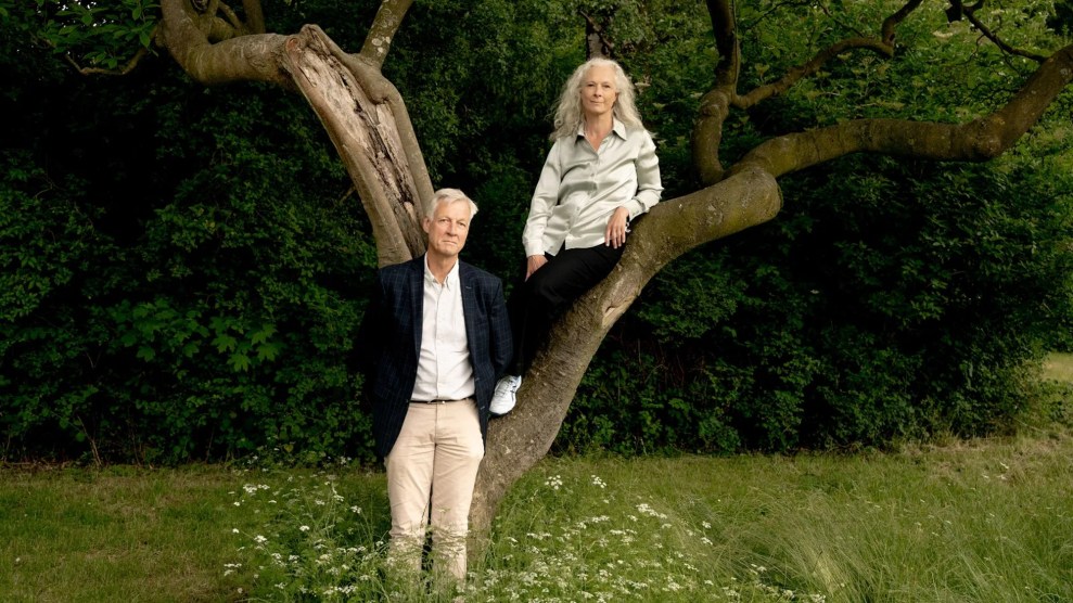 Peter and Susanne Ditlevsen reside near a tree in a meadow.