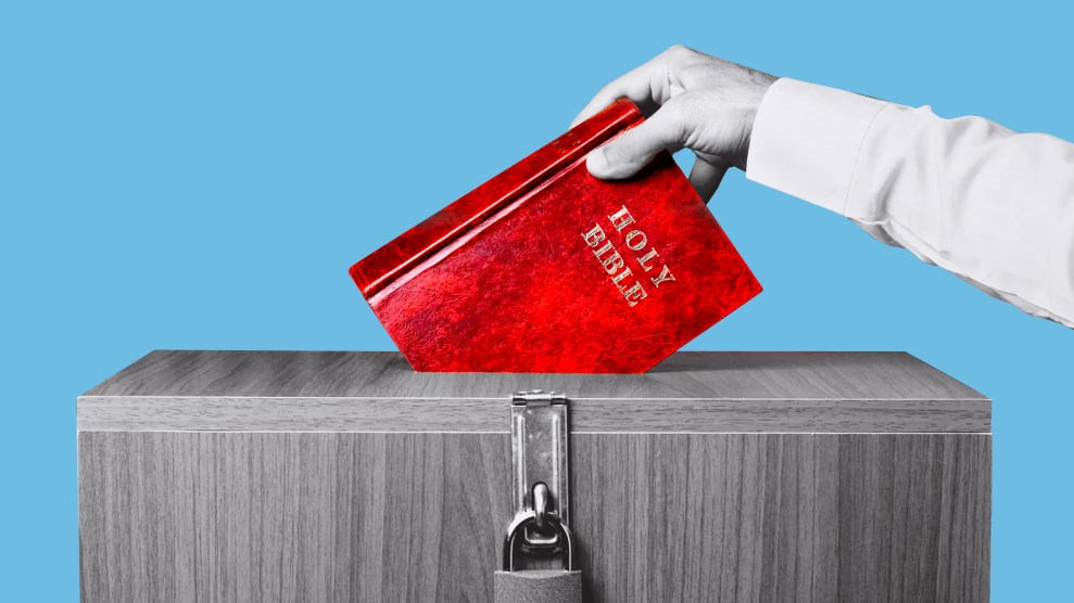 A man placing a Holy Bible in the slot of a locked ballot box.