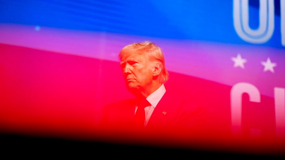 Donald Trump with a strip of red in front of him.