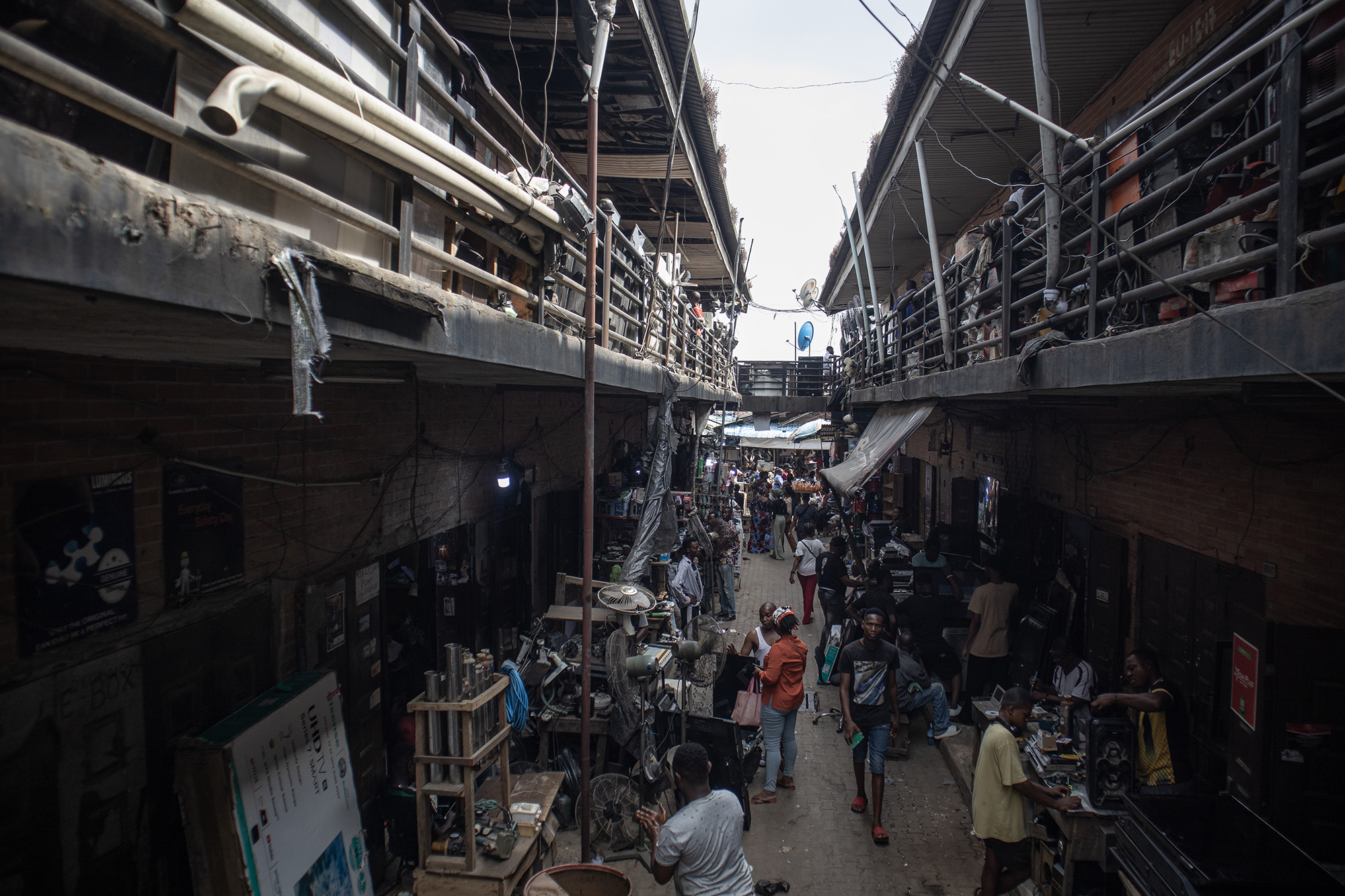 Crowded two-story open-air market.