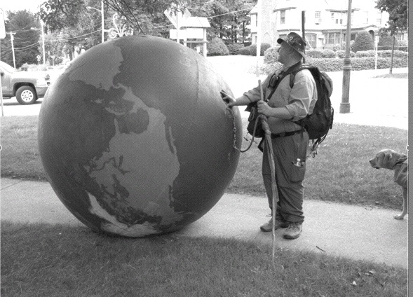 World on a String: Erik Bendl, 48, of Louisive, KY, is pushing this to-scale (maybe) model of the Earth from Washington, DC to Maine to raise awareness of Diabetes (Photo: Alex Gontar).