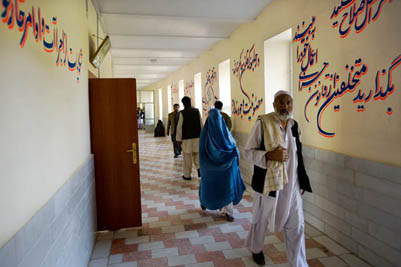 Reminders about the letter of the law are painted on the corridor outside Maria Bashir's office.