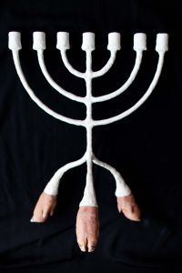 A candelabra made from the pig's hoofs. : Photo by Chris Fiel