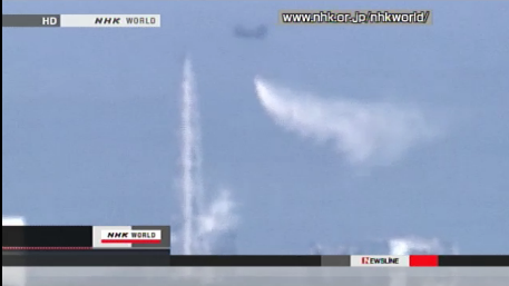 A helicpoter dropping water on the Fukushima Daiichi nuclear plant