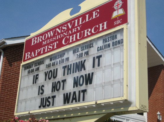 Global Warming: Whether it's climate change you fear, or just the fiery inferno of hell, things are looking a little bleak here on Earth. This message comes from a chuch in Brownsville, Kentucky (Photo: Tim Murphy)