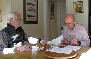 Kitchen-table economics: Paul (left) talks energy savings with Langdon.