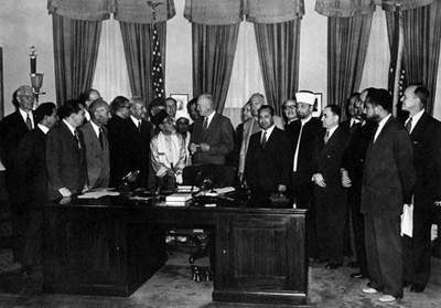 President Dwight D. Eisenhower in the Oval Office with a group of Muslim delegates, 1953. Said Ramadan is second from the right.