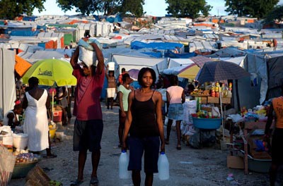 The main market in one of the 1,300 tent cities that pock Port-au-Prince, makeshift encampments home to 1.2 million people and terrorized by gangs of rapists. 