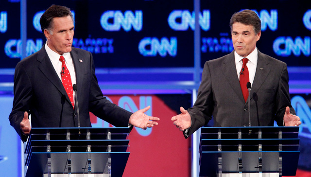 Mitt Romney and Rick Perry at the CNN/Tea Party Express on September 12, 2011.: Edmund D. Fountain/St. Petersburg Times/Zuma