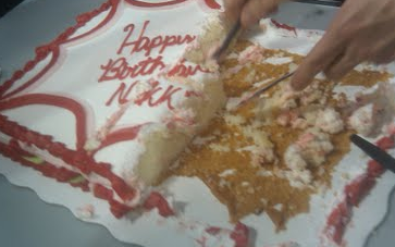 Romney let his supporters eat cake at a rally in North Charleston.: Photo by Tim Murphy