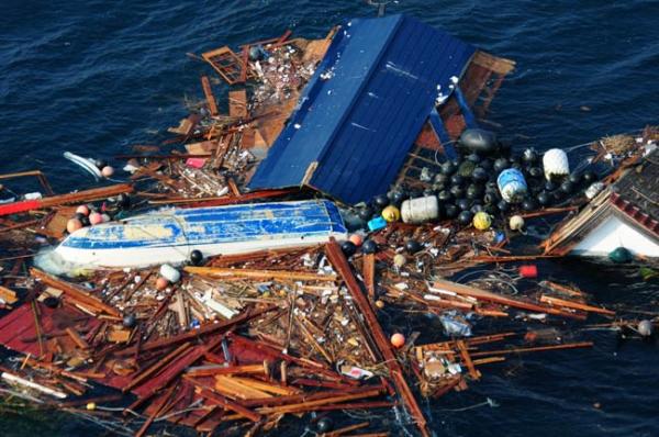 Tsunami debris afloat in the Pacific after the 11 Mar 2011 earthquake and tsunami off Japan.: Credit: US Navy/ Specialist 3rd Class Alexander Tidd.
