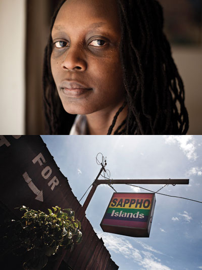 LGBT activist Kasha Nabagesera. The sign for her Sappho Islands bar still hangs even though the pub was torn down.